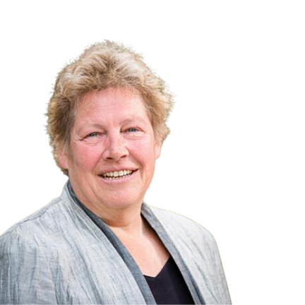 Portretfoto van Puck Huitsing. Een vrouw met kort blond haar. Ze draagt een zwarte top met daaroverheen een grijs vest.